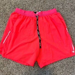 Nike Dri-fit lined running shorts. Size L. Orange.